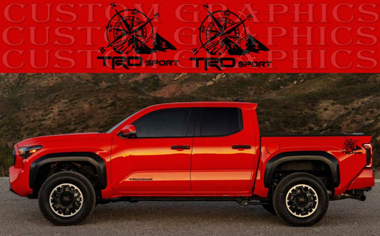 A red Toyota Tacoma pickup truck with a set of custom decals on the side, featuring a geometric design.